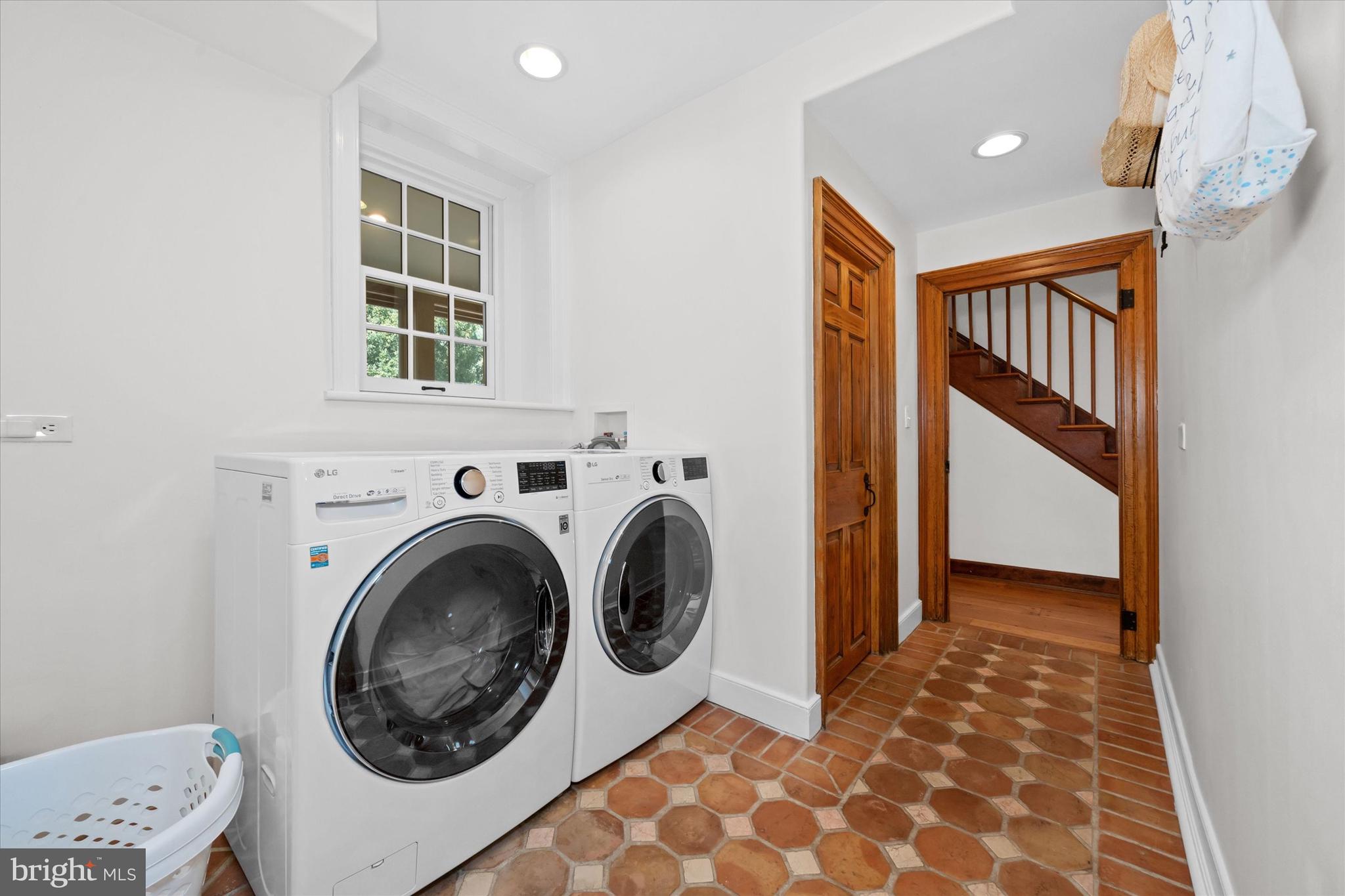 1439 Old Wilmington Road Hockessin, DE 19707 - Photo 28 of 57 a view of a hallway with washer and dryer