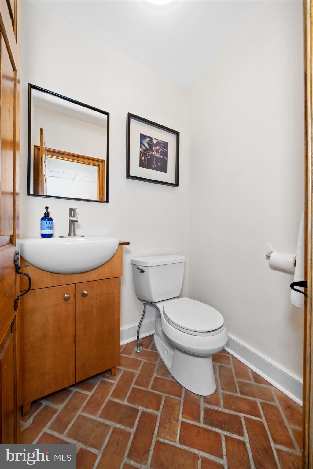 1439 Old Wilmington Road Hockessin, DE 19707 - Photo 29 of 57 a bathroom with a sink and a toilet