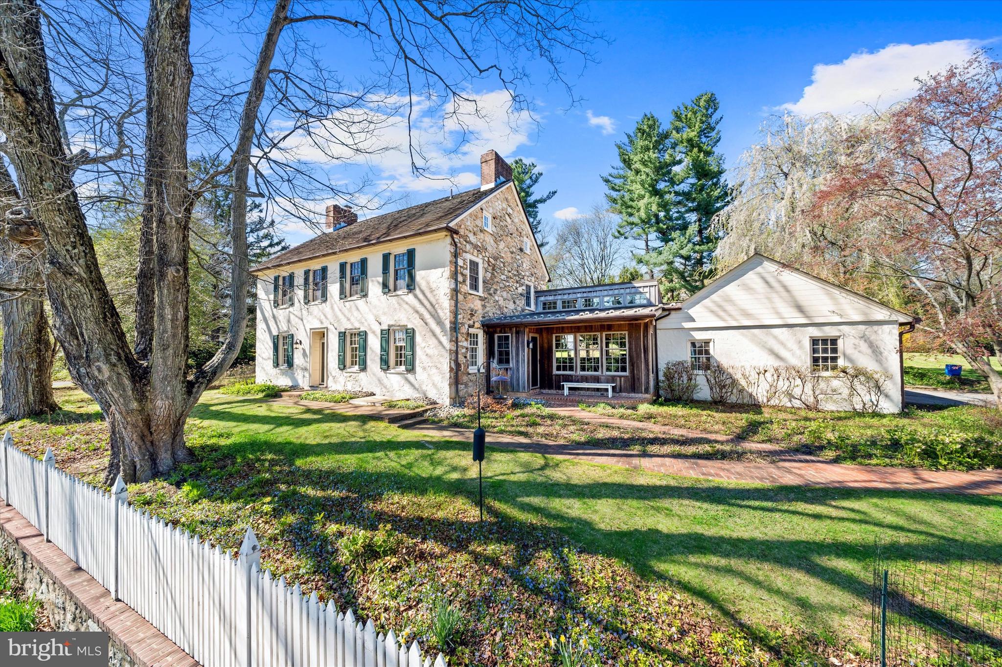 1439 Old Wilmington Road Hockessin, DE 19707 - Photo 3 of 57 a front view of a house with a yard