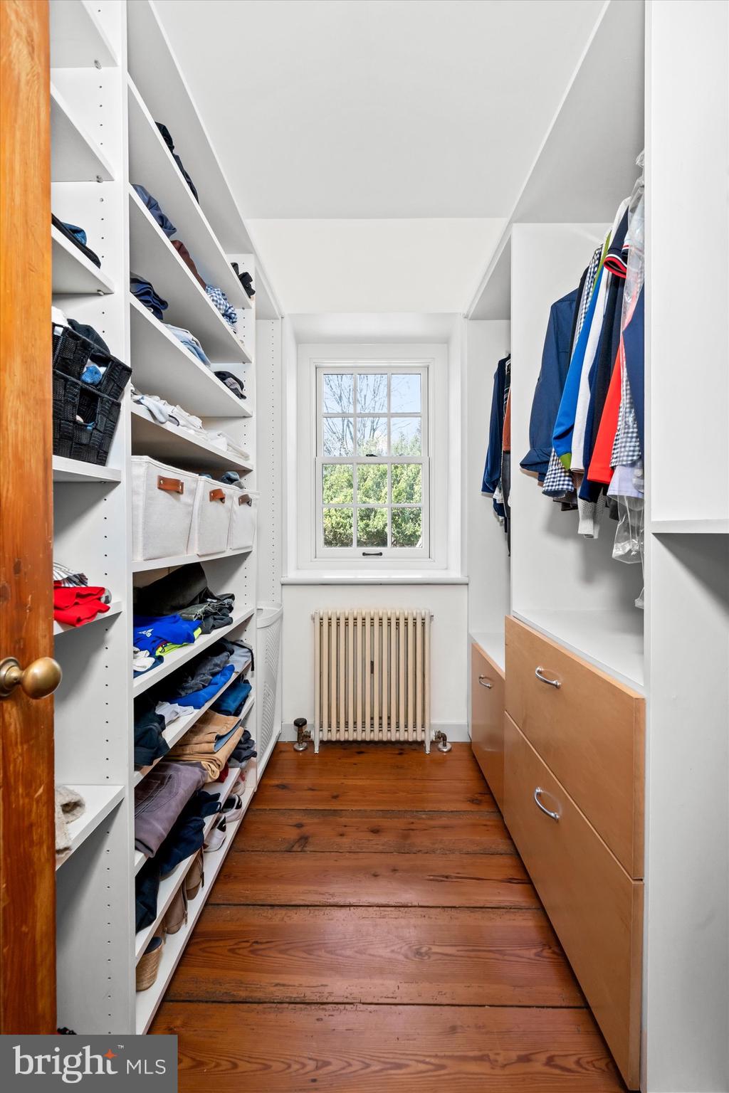 1439 Old Wilmington Road Hockessin, DE 19707 - Photo 33 of 57 a hallway with painting and a window