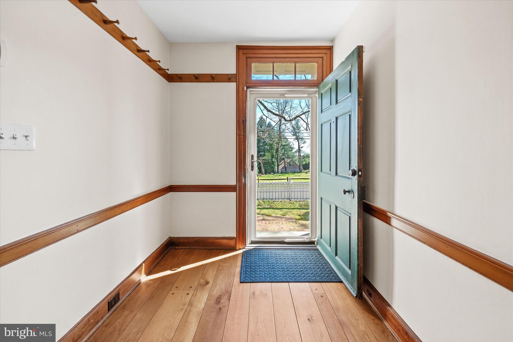 1439 Old Wilmington Road Hockessin, DE 19707 - Photo 10 of 57 a view of entryway with wooden floor and stairs