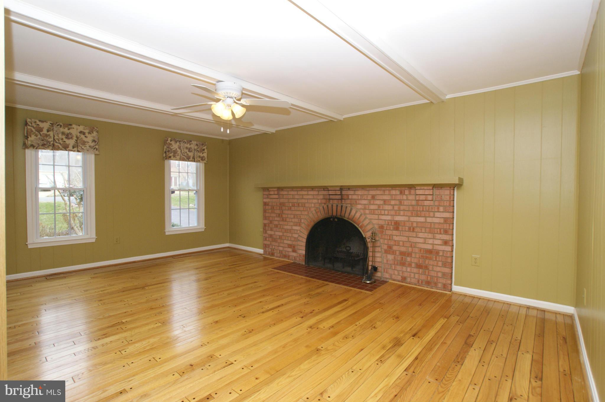 7804 Cliffside Court Springfield, VA 22153 - Photo 12 of 30 Family Room with wood burning fireplace. 13' x 18'