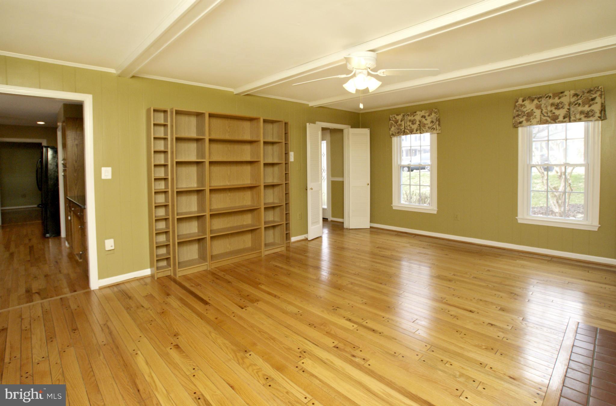 7804 Cliffside Court Springfield, VA 22153 - Photo 13 of 30 Family Room with shelves for more 13' x 18'