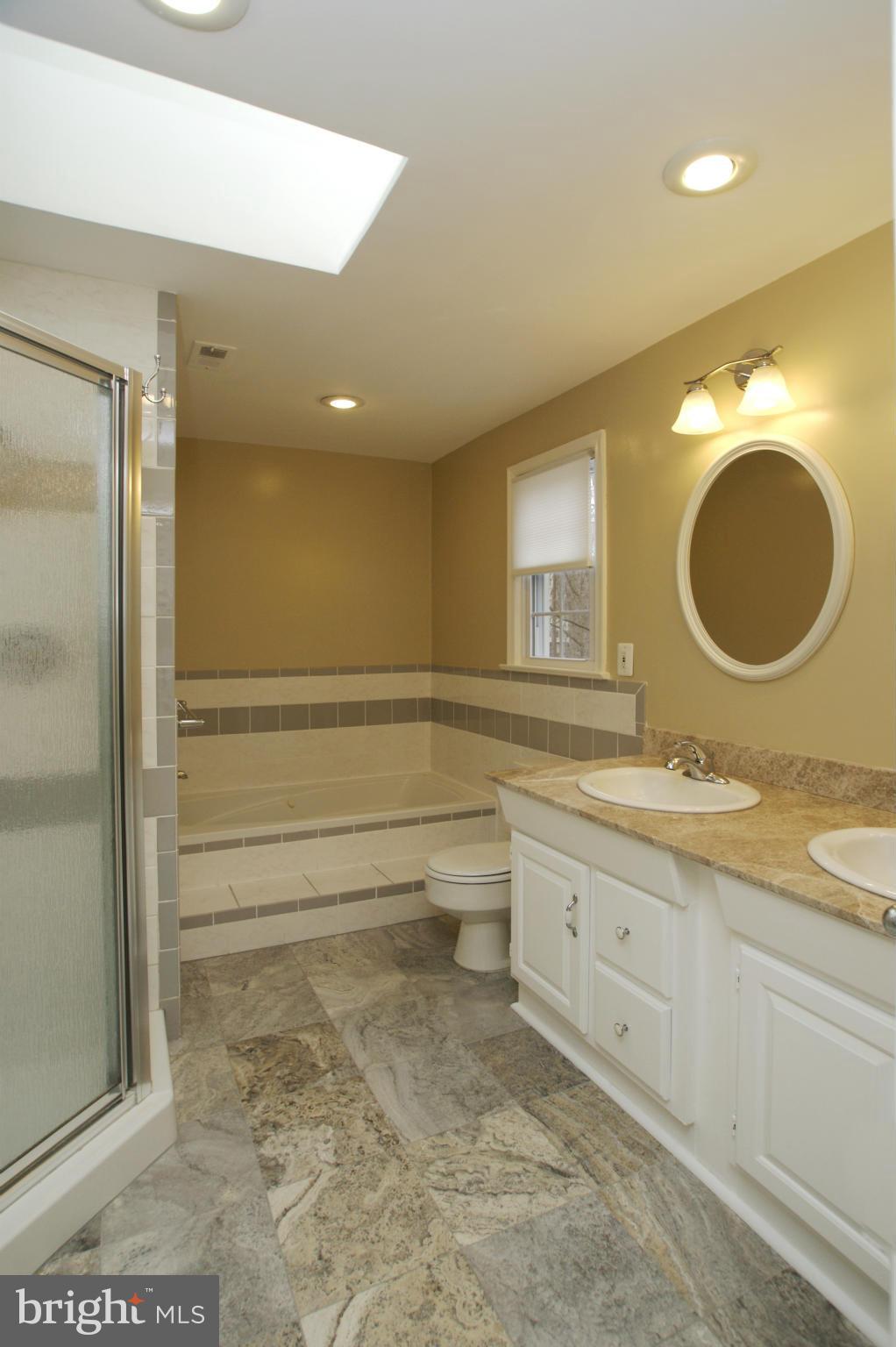 7804 Cliffside Court Springfield, VA 22153 - Photo 19 of 30 Master bath with separate sinks.