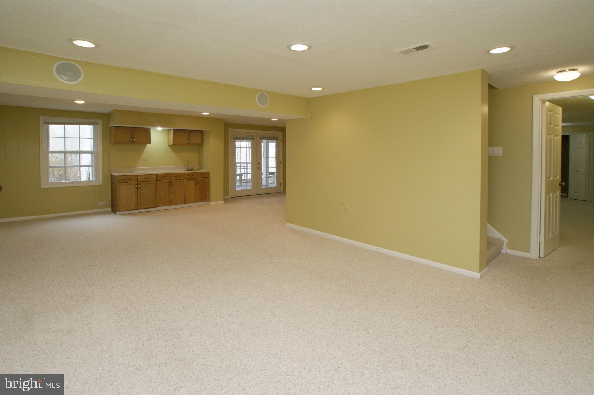7804 Cliffside Court Springfield, VA 22153 - Photo 24 of 30 HUGE rec room, play room, fun room, 24' x 12'