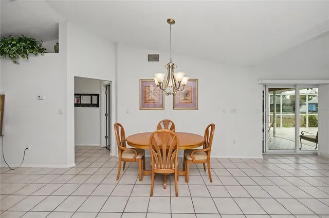 a bed room with a bed and a window