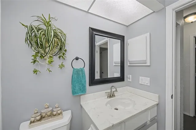 a view of a house with porch and chairs