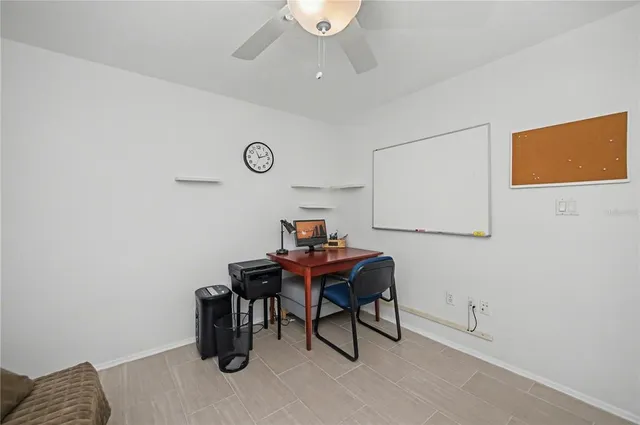 a view of a house with backyard and porch