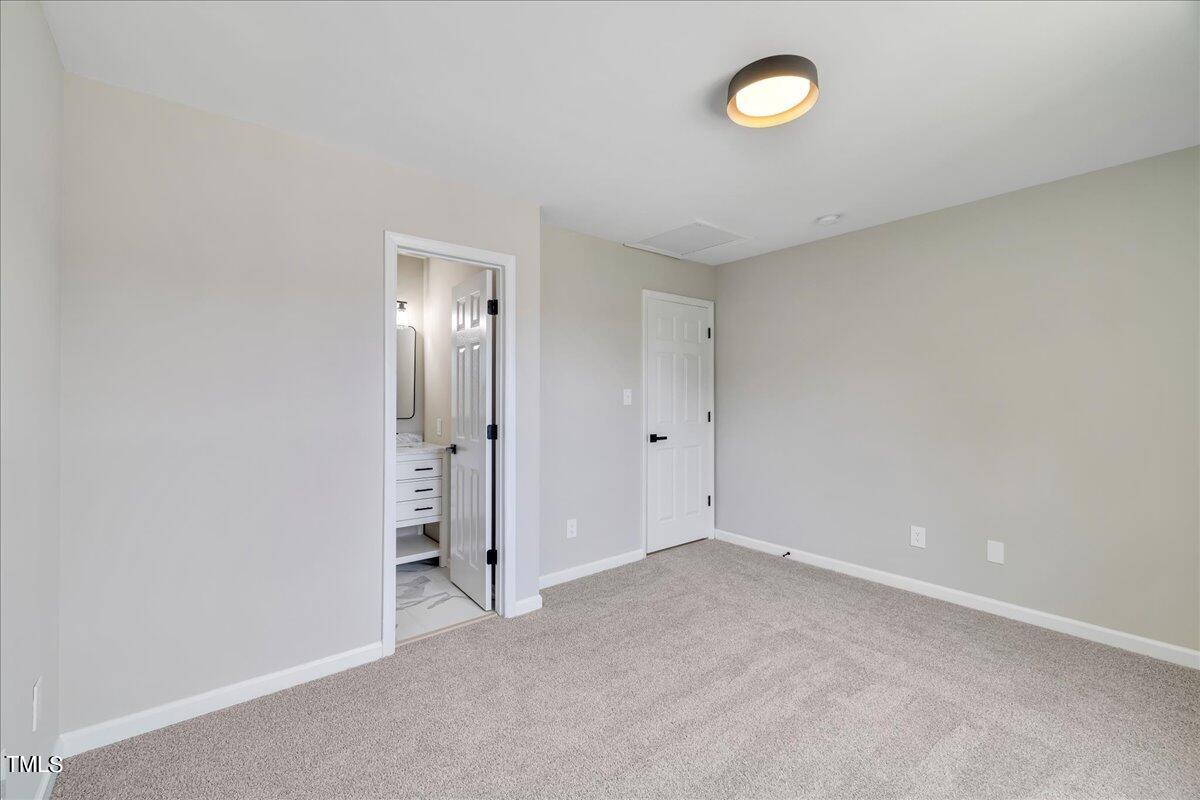 403 East Williams Street Angier, NC 27501 - Photo 19 of 38 a view of an empty room