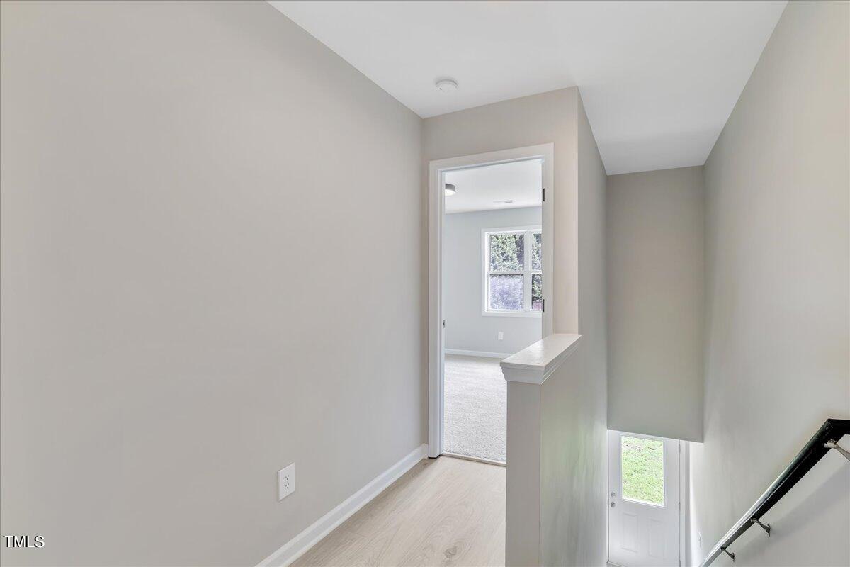 403 East Williams Street Angier, NC 27501 - Photo 22 of 38 a view of hallway with stairs