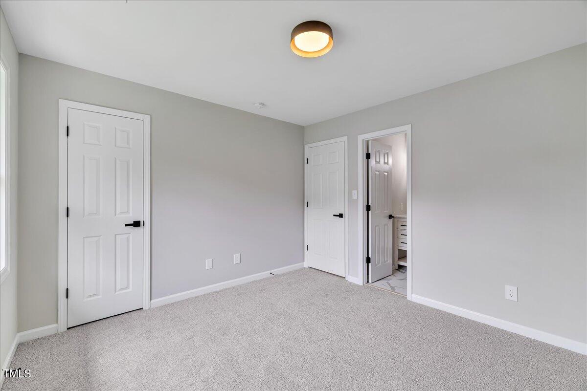 403 East Williams Street Angier, NC 27501 - Photo 24 of 38 a view of an empty room