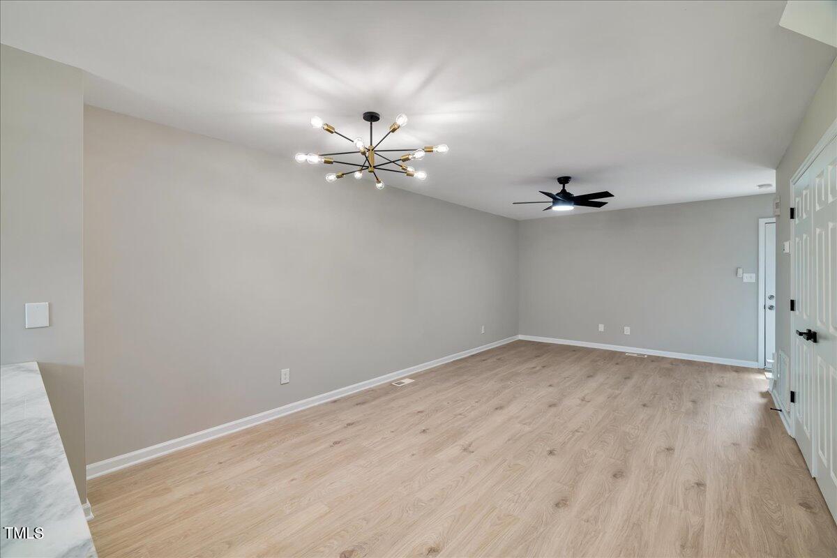 403 East Williams Street Angier, NC 27501 - Photo 10 of 38 wooden floor in an empty room