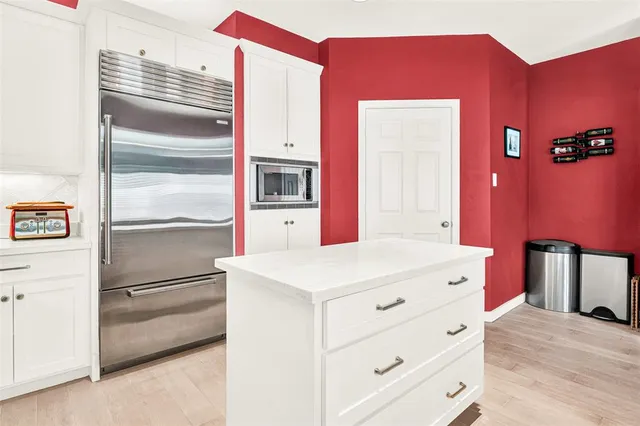 a view of workspace with furniture and a window
