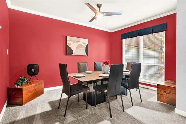 a living room with furniture cabinets and a flat screen tv