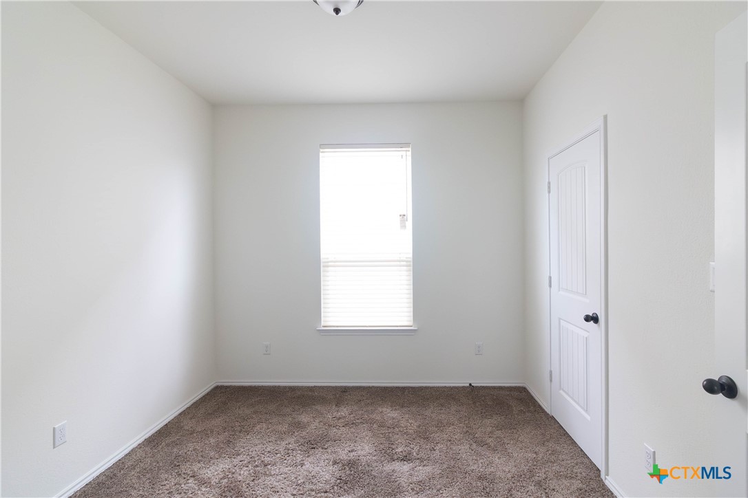 1131 Aronia Lane Georgetown, TX 78626 - Photo 19 of 36 an empty room with a window