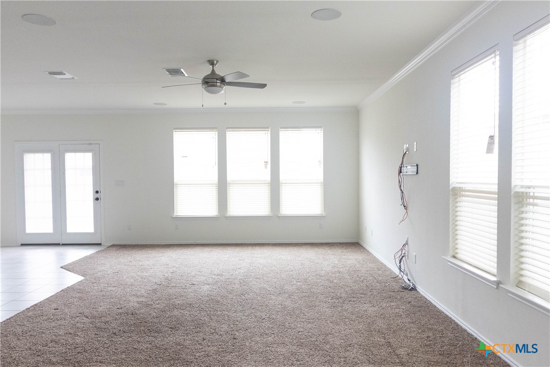 1131 Aronia Lane Georgetown, TX 78626 - Photo 2 of 36 a view of an empty room with a window