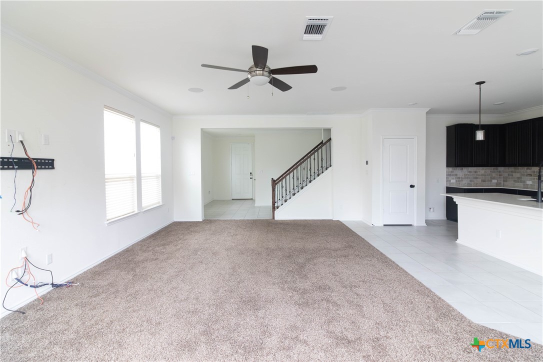 1131 Aronia Lane Georgetown, TX 78626 - Photo 3 of 36 a view of a livingroom with a ceiling fan and window