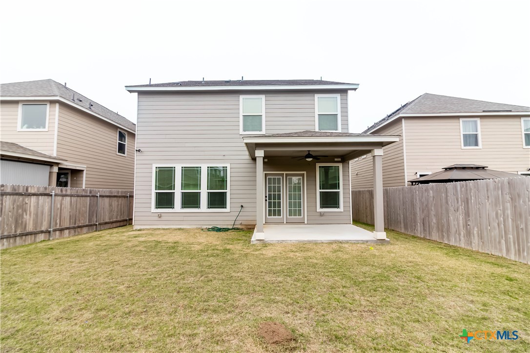 1131 Aronia Lane Georgetown, TX 78626 - Photo 34 of 36 a view of a house with wooden floor and a yard