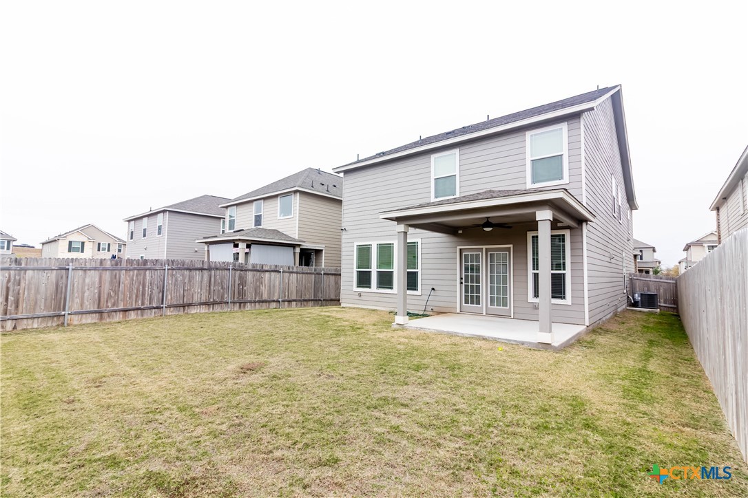 1131 Aronia Lane Georgetown, TX 78626 - Photo 35 of 36 a view of a house with a yard and deck