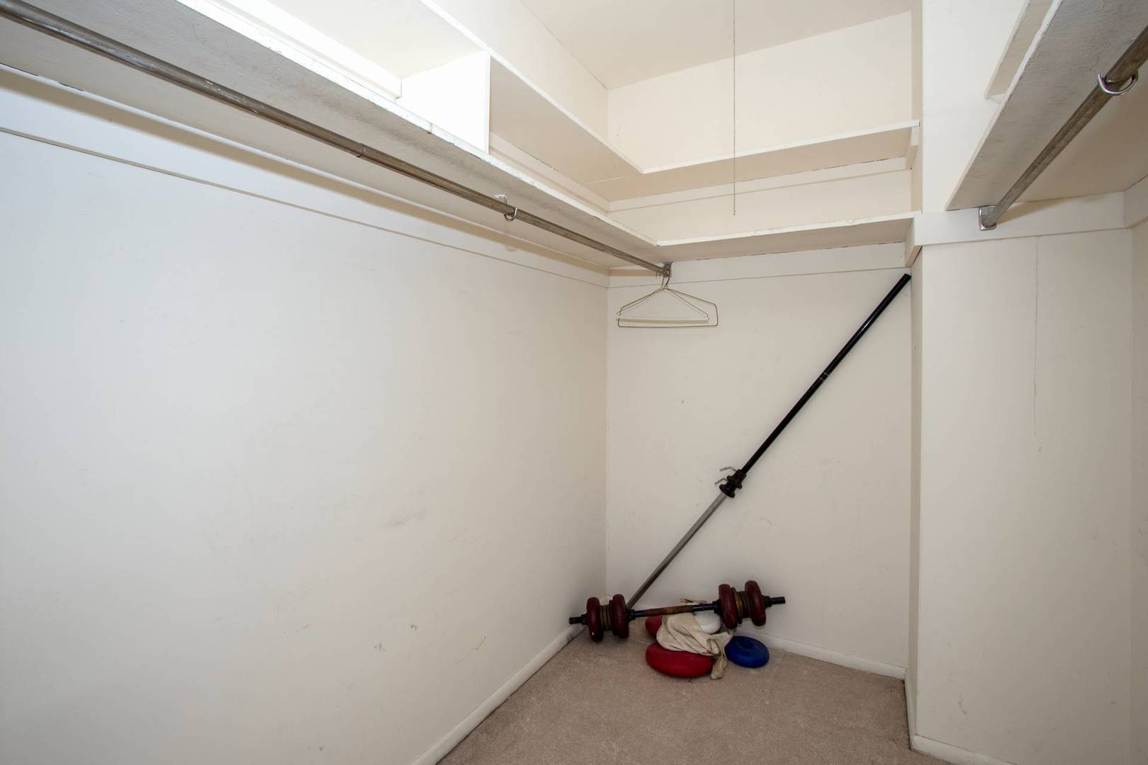 5757 North Sheridan Road, Unit 18J Chicago, IL 60660 - Photo 10 of 16 a view of gym equipment with wooden floor