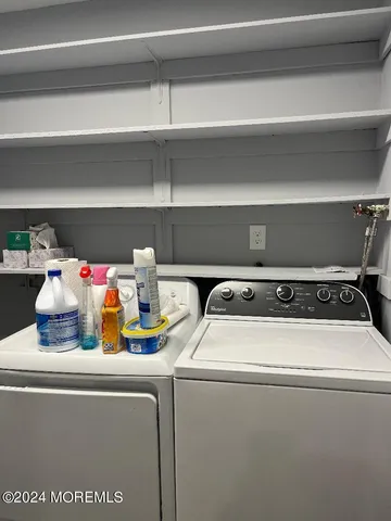 a utility room with washer and dryer