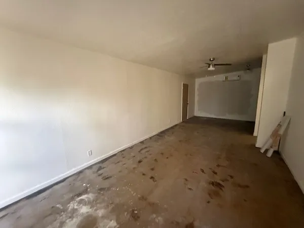 an empty room with a garage