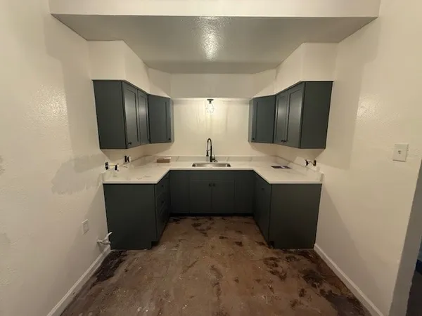 a bathroom with a double vanity sink and mirror