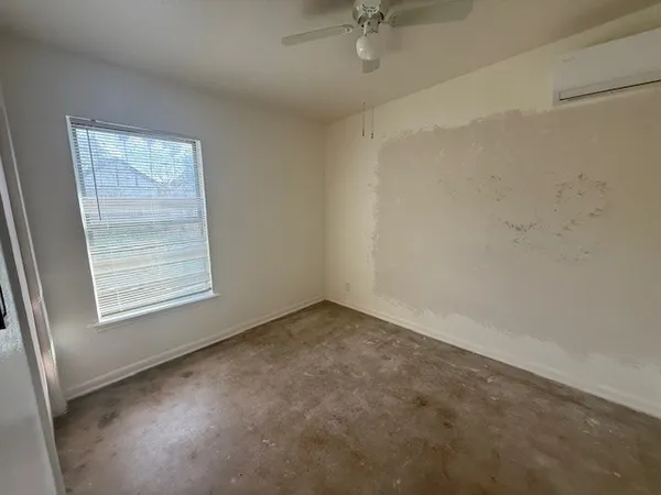 an empty room with a window
