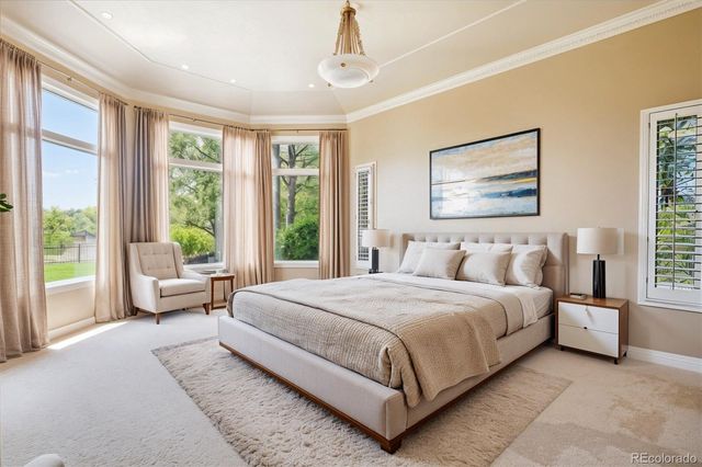 a view of a kitchen with stainless steel appliances granite countertop a sink counter space and a stove