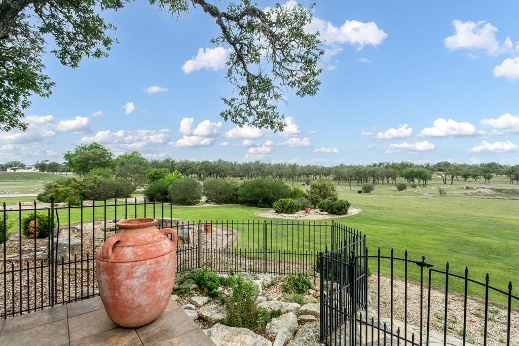 1320 Pass Creek Road East Center Point, TX 78010 - Photo 24 of 51 a view of a balcony with a garden