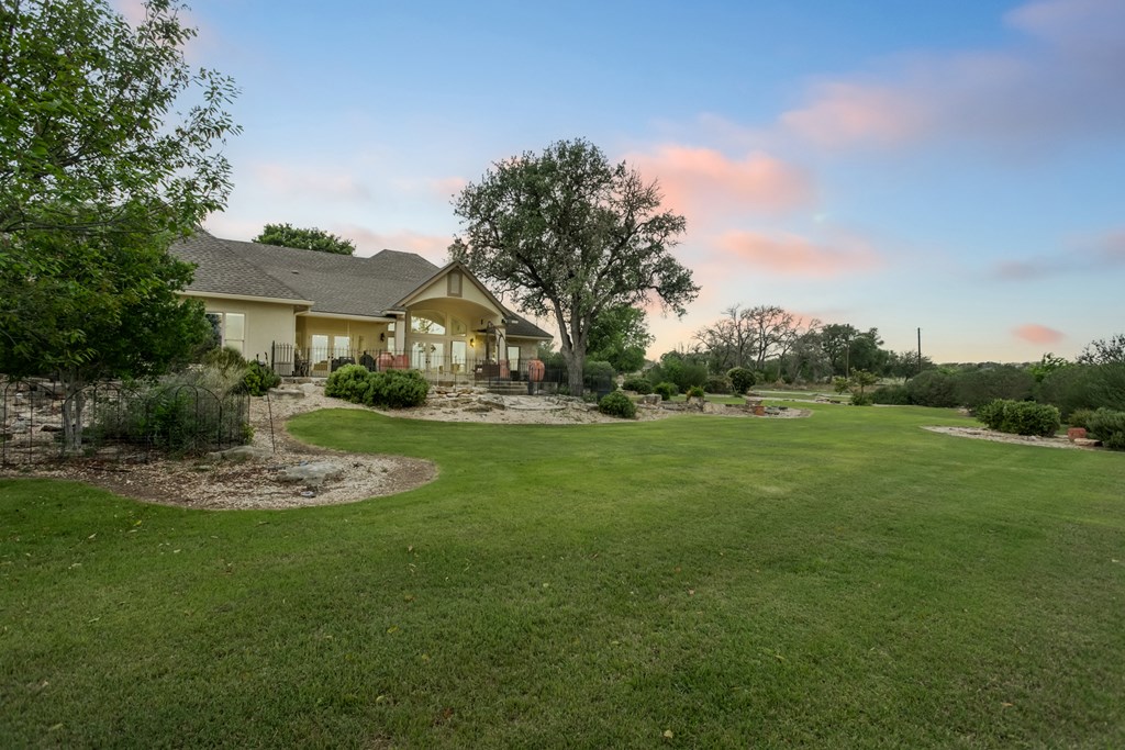 1320 Pass Creek Road East Center Point, TX 78010 - Photo 25 of 51 a view of a house with a big yard