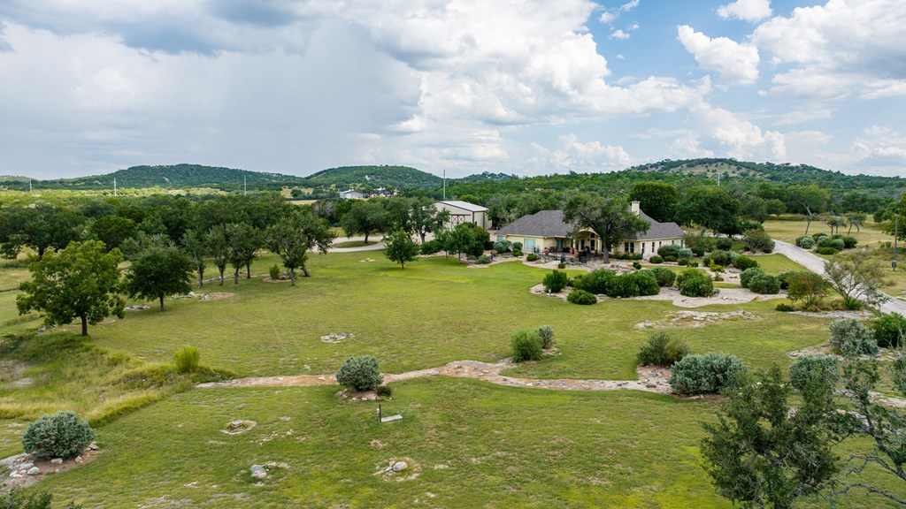 1320 Pass Creek Road East Center Point, TX 78010 - Photo 26 of 51 a view of a lake with houses