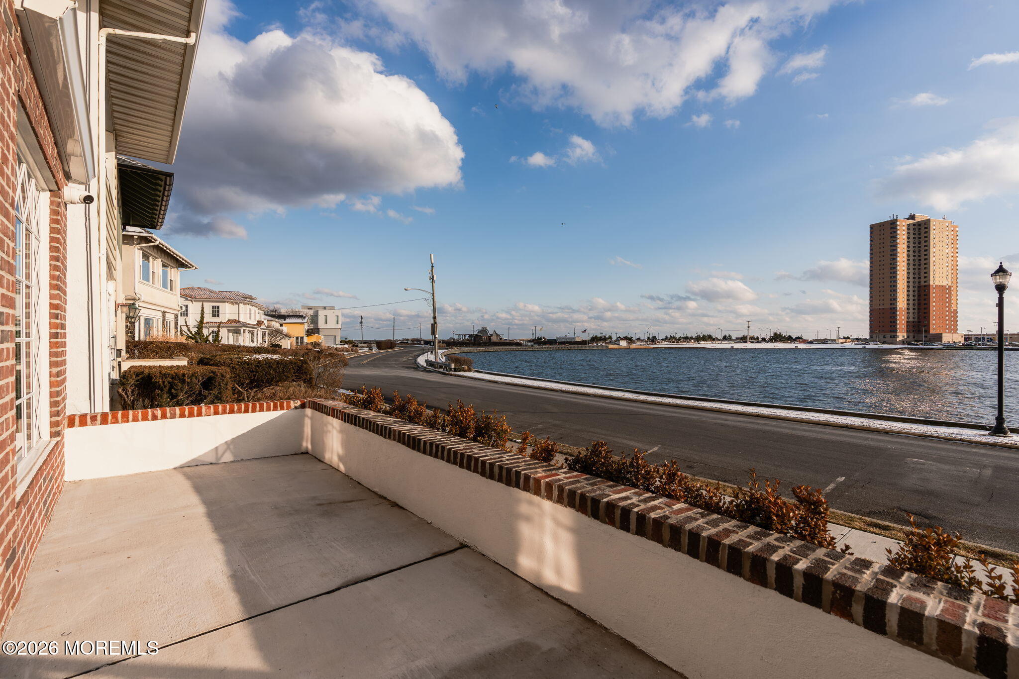 205 Edgemont Drive, Unit 1 Allenhurst, NJ 07711 - Photo 22 of 24 a view of swimming pool from a balcony
