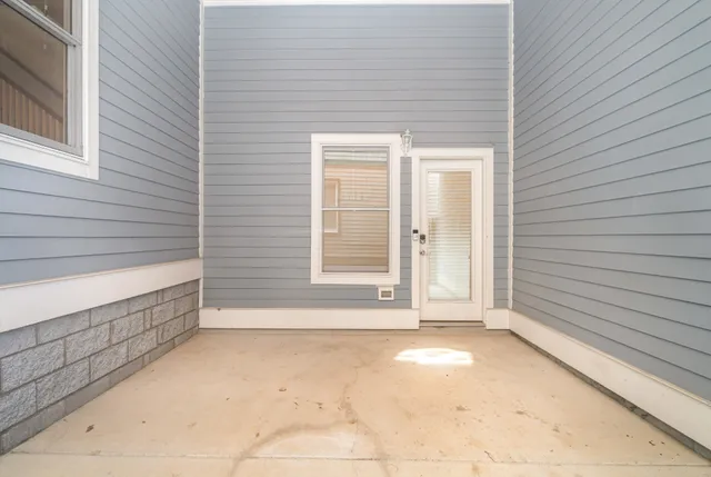 a view of a wooden door and outside view