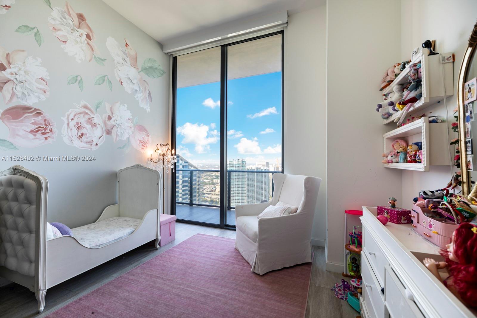 45 Southwest 9th Street, Unit PH4801 Miami, FL 33130 - Photo 25 of 41 a living room with furniture and a floor to ceiling window