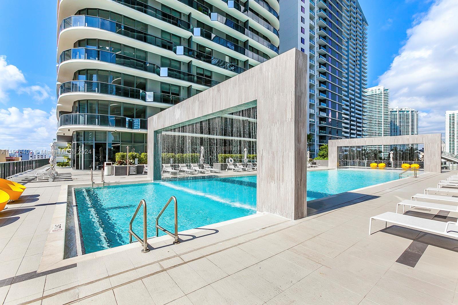 45 Southwest 9th Street, Unit PH4801 Miami, FL 33130 - Photo 29 of 41 a view of swimming pool with outdoor seating