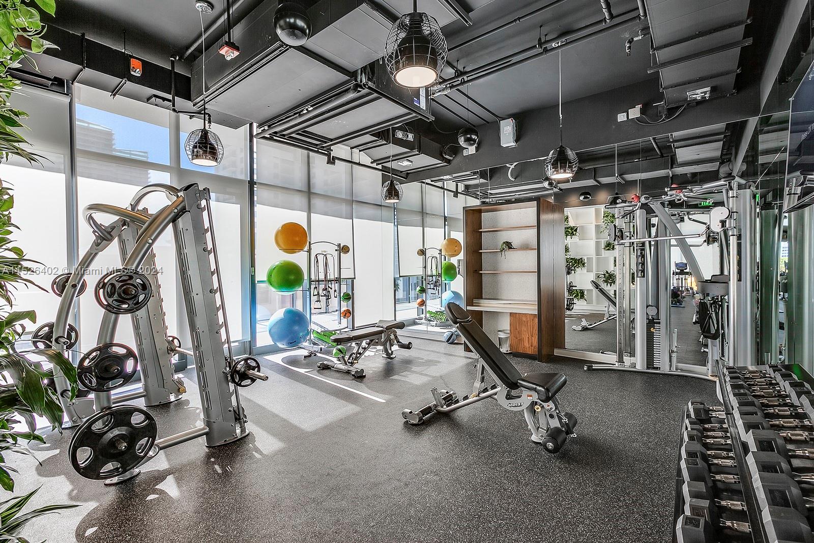 45 Southwest 9th Street, Unit PH4801 Miami, FL 33130 - Photo 39 of 41 a view of a room with gym equipment