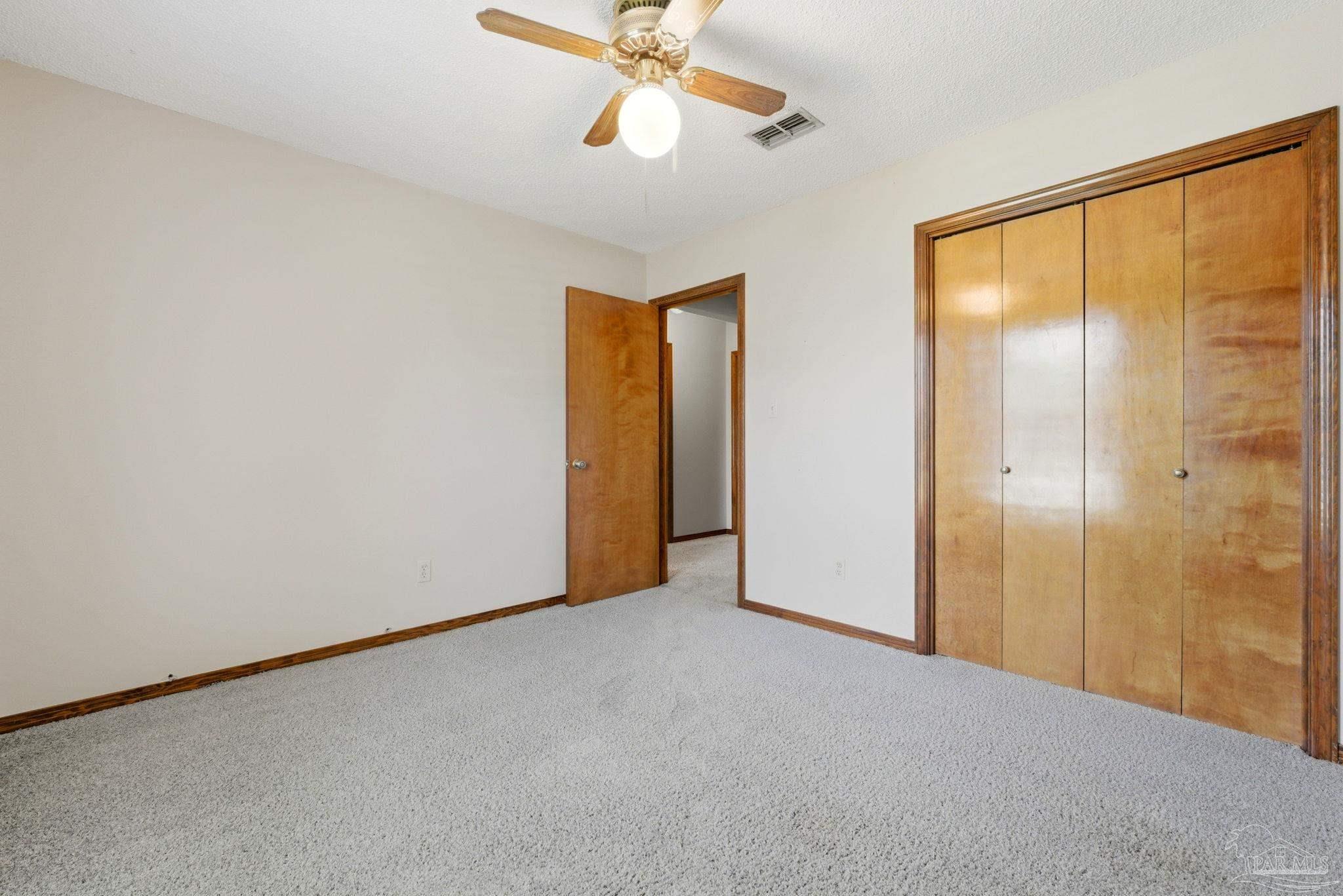 934 Springmier Place Pensacola, FL 32514 - Photo 15 of 49 a view of an empty room with a window