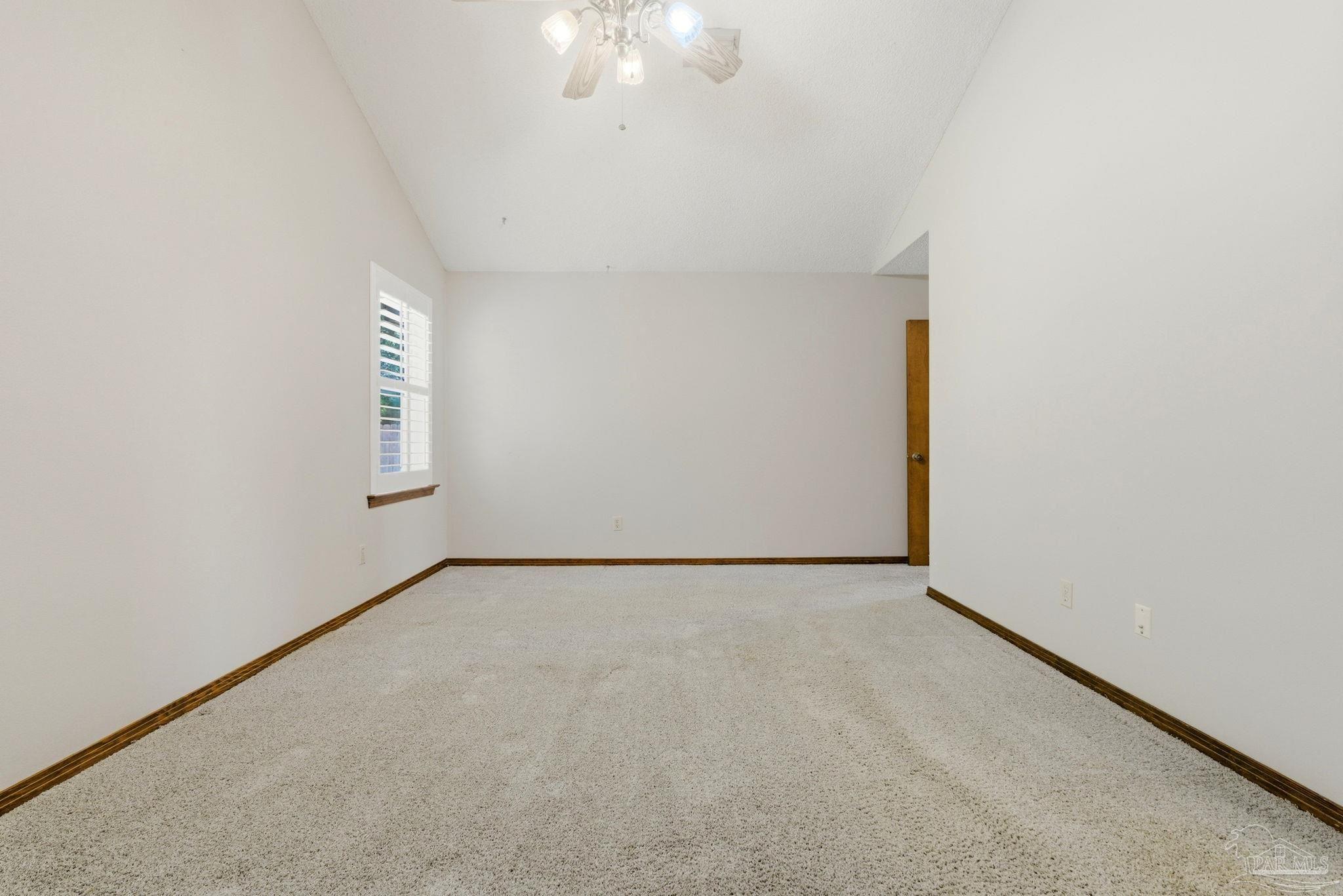 934 Springmier Place Pensacola, FL 32514 - Photo 21 of 49 a view of an empty room with a window