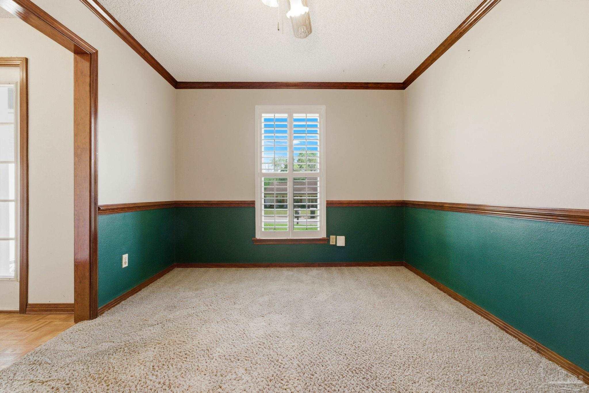 934 Springmier Place Pensacola, FL 32514 - Photo 25 of 49 a bedroom with a bed and a window