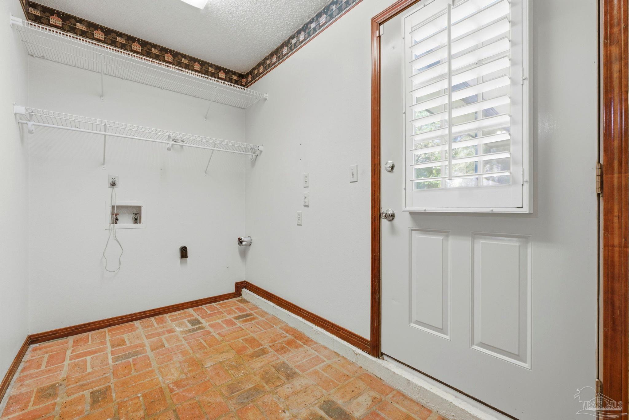 934 Springmier Place Pensacola, FL 32514 - Photo 28 of 49 a view of empty room with wooden floor and fan