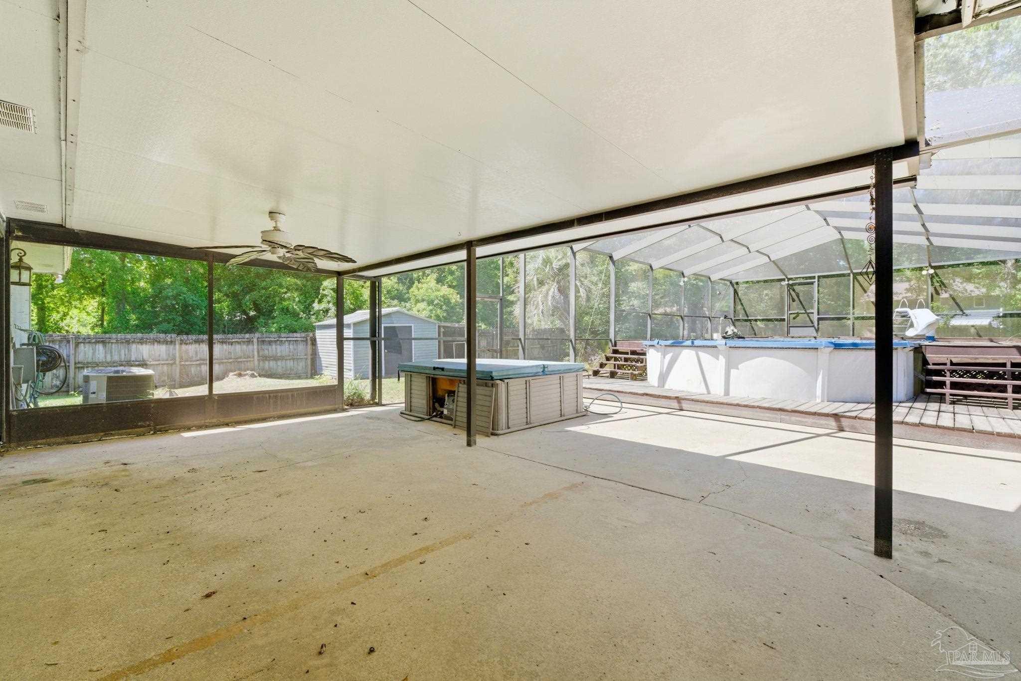 934 Springmier Place Pensacola, FL 32514 - Photo 31 of 49 a view of an empty room with a floor to ceiling window