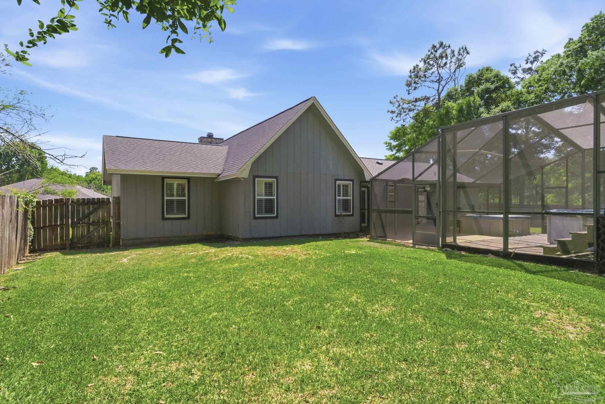 934 Springmier Place Pensacola, FL 32514 - Photo 34 of 49 a house view with a garden space
