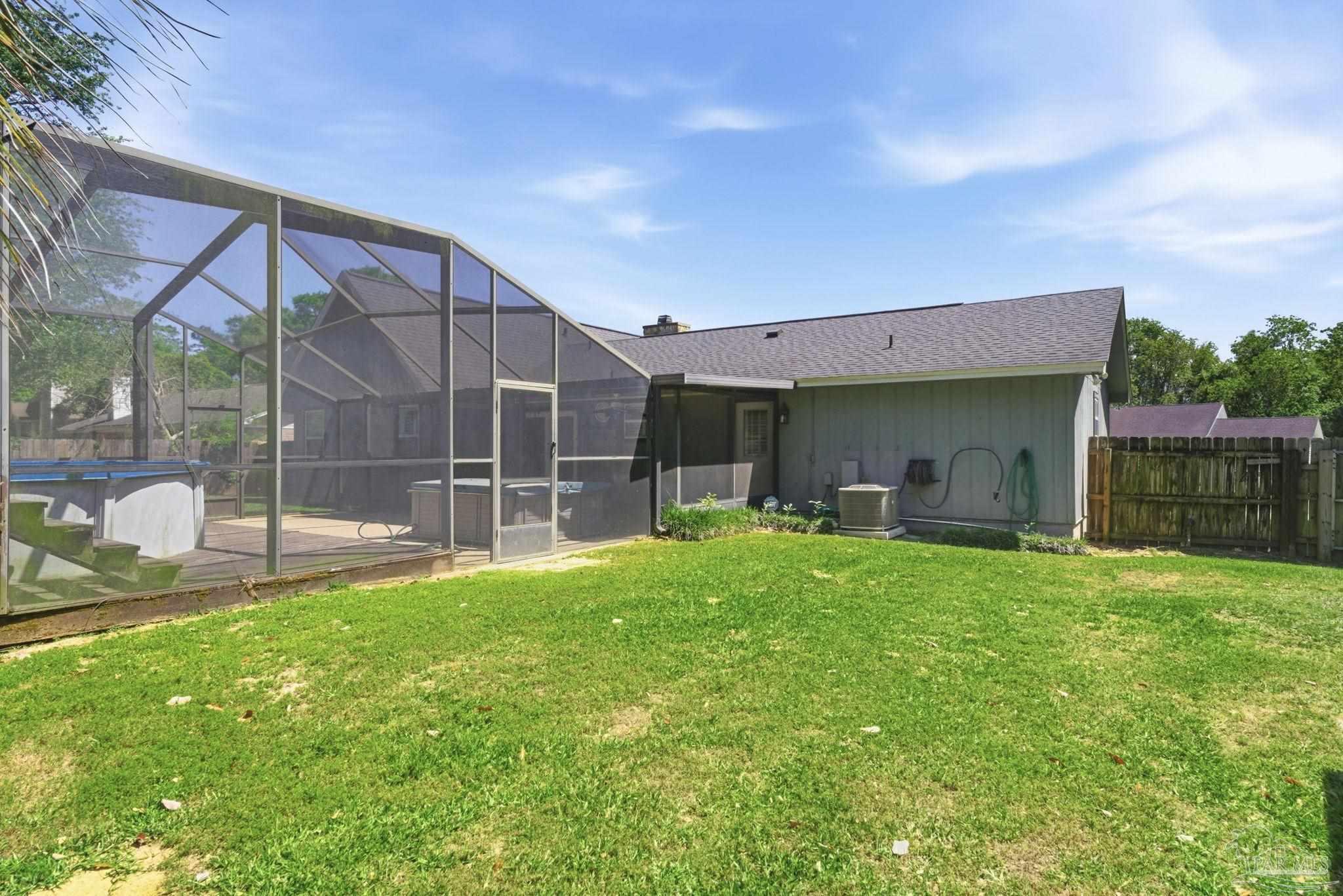 934 Springmier Place Pensacola, FL 32514 - Photo 39 of 49 a view of a house with backyard and porch