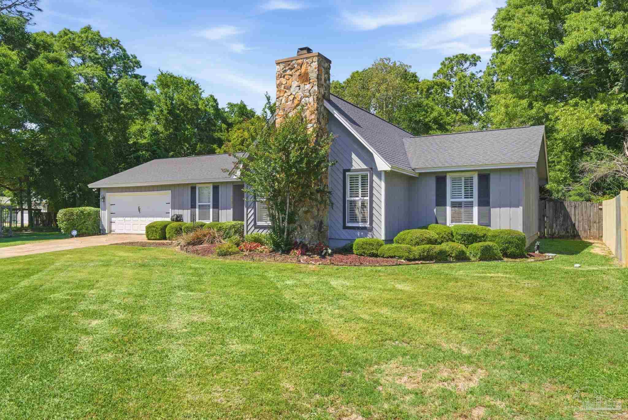 934 Springmier Place Pensacola, FL 32514 - Photo 47 of 49 a front view of a house with a yard