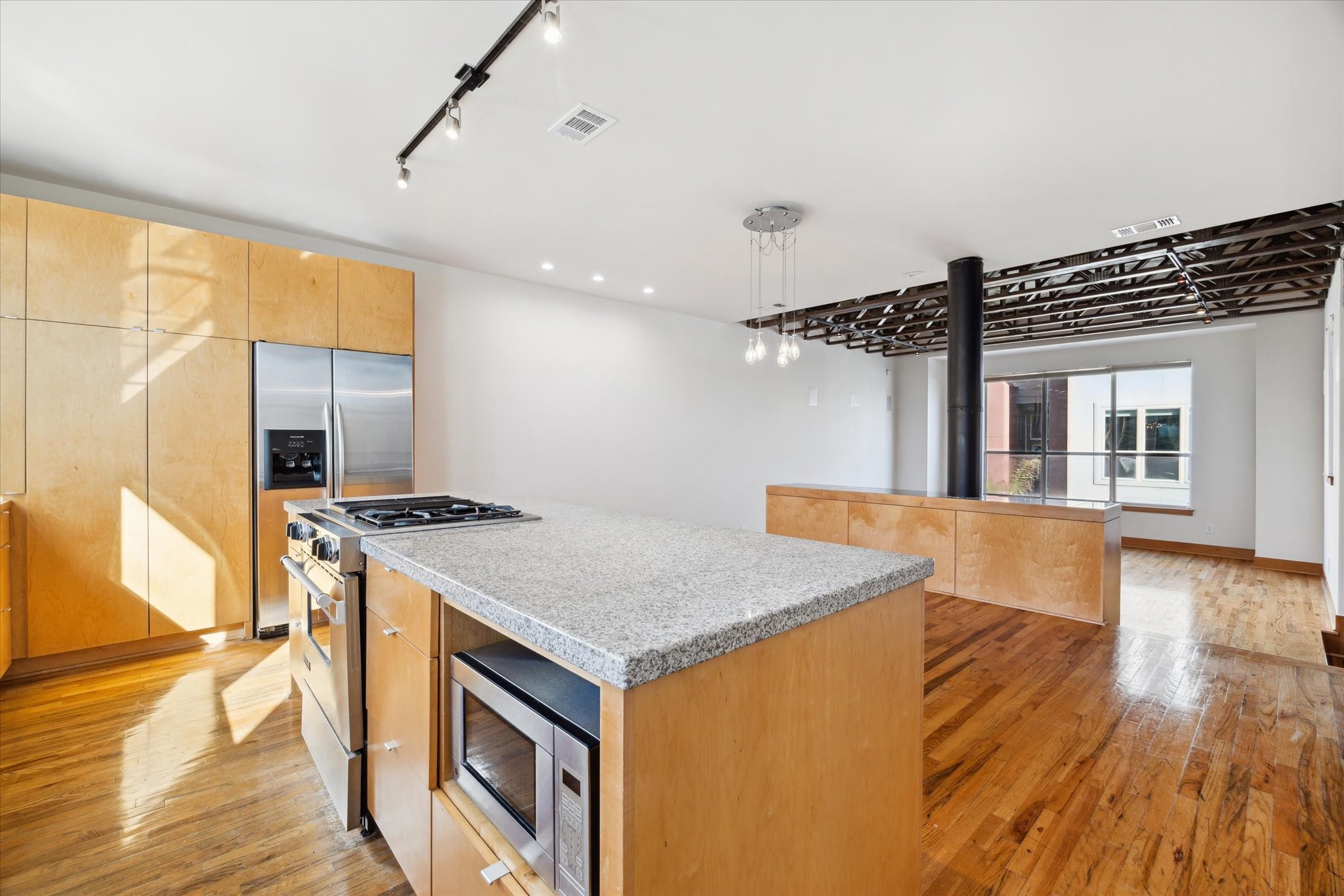 94 Drew Street, Unit C Houston, TX 77006 - Photo 14 of 29 Chef kitchen is light and airy. Plenty of room for more than one cook!