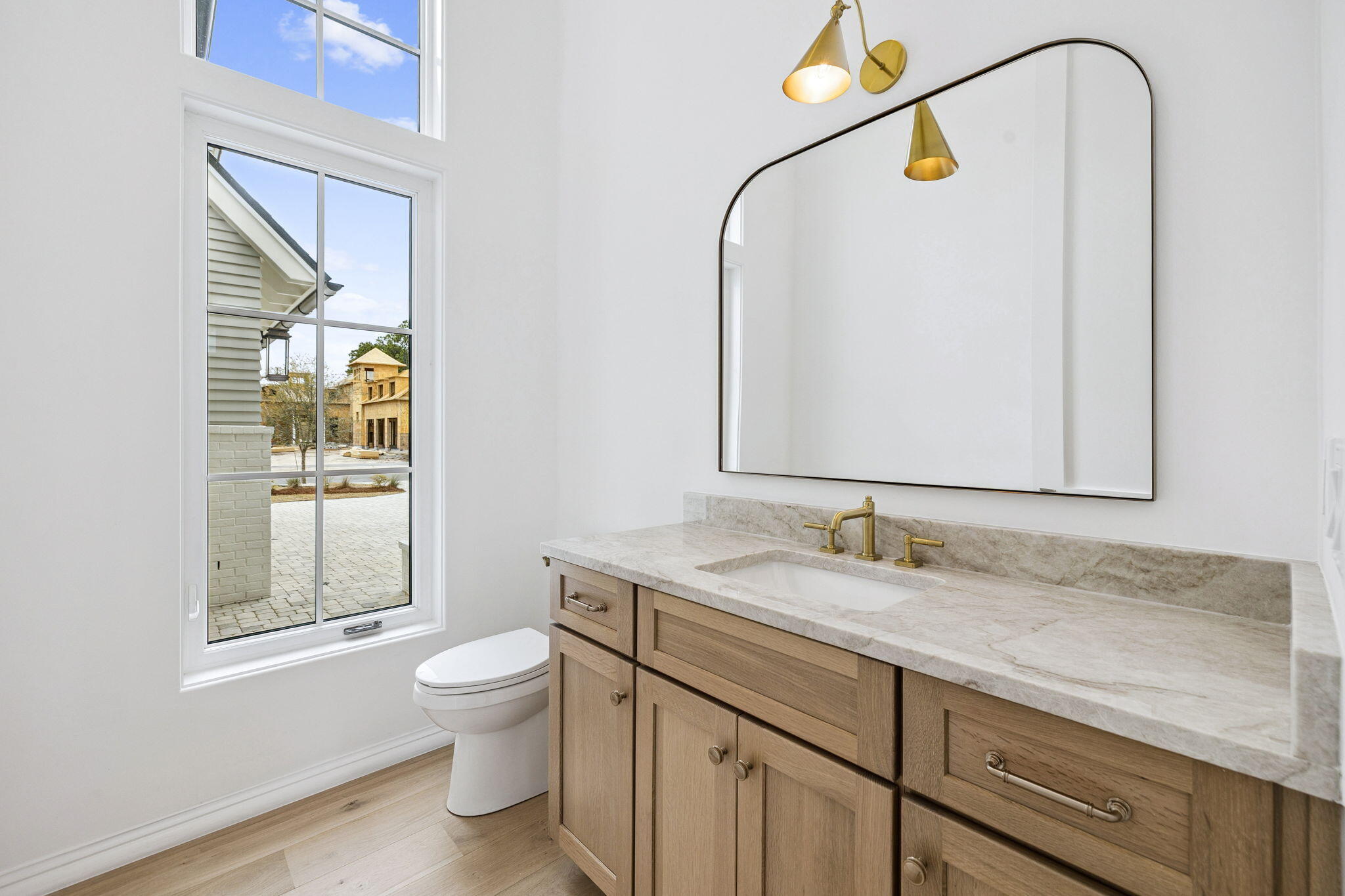 970 Windsong Dr Inlet Beach Inlet Beach, FL 32461 - Photo 27 of 78 a bathroom with a granite countertop sink a toilet and a mirror