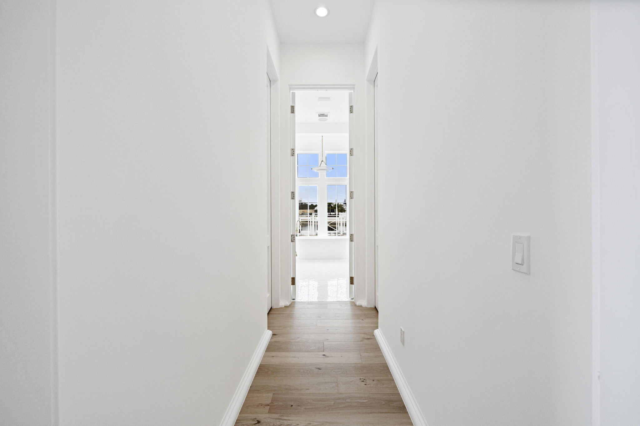 970 Windsong Dr Inlet Beach Inlet Beach, FL 32461 - Photo 29 of 78 a view of a hallway with wooden floor and staircase