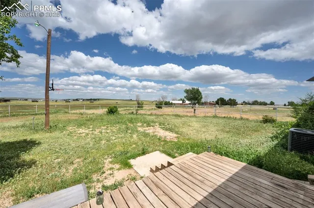 a view of a lake with a big yard