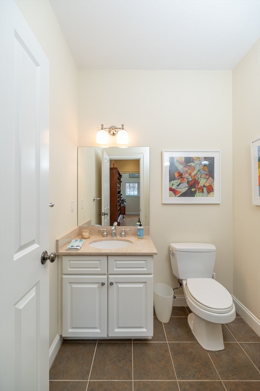 6 Essex Road, Unit 8 Ipswich, MA 01938 - Photo 13 of 35 a spacious bathroom with a toilet sink and mirror